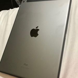 Apple ipad 8th generation black and grey 10.2” screen